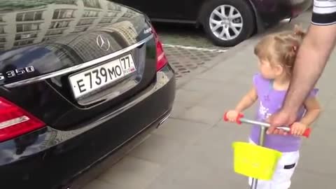 Girl knows all brands of Cars