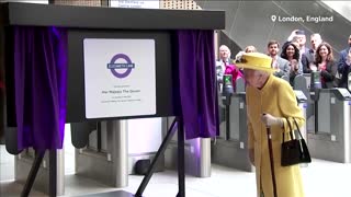 Britain's Queen Elizabeth opens train line named in her honor