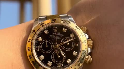 Rolex Daytona gold and black diamond engraved