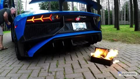 Lamborghini proprietor gets a fire going with his vehicle exhaust.