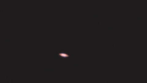 Saturn through a Cassini telescope