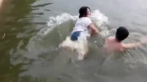 Couple competing in swimming