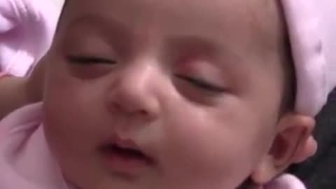 Adorable Baby Having Happy Dreams