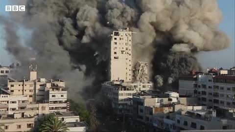 Israel-Gaza: Strike collapses building during live