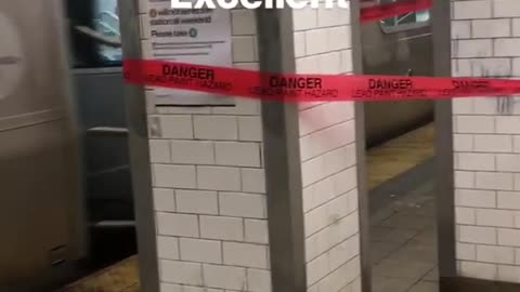 Lead paint warning tape wrapped around subway station