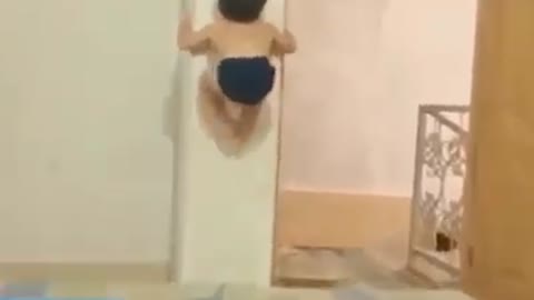 Amazing super kid - climbing on the wall