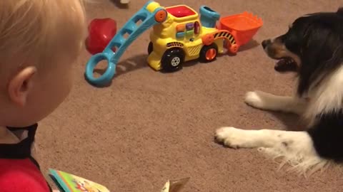 Dog and baby appear to have their own secret language