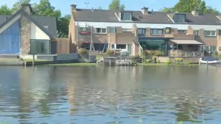 Peaceful drive along a canal in Holland