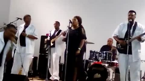 Wings of faith singing The Devil don't like me no more and Jesus is a friend