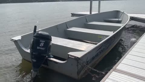 A boat tied up to the dock