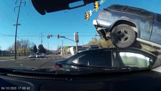 Red Light Runner Lifts Truck Onto Traffic