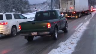 Truck Goes Nowhere Fast on Icy Roads