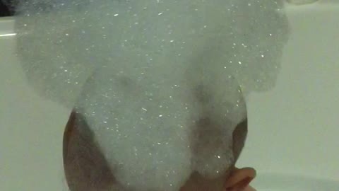 Baby Santa in bath