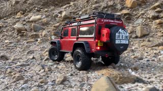 Traxxas TRX-4 Defender escaping from home to a rock crawling ride