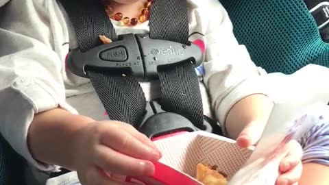 Toddler is in awe over chicken nuggets