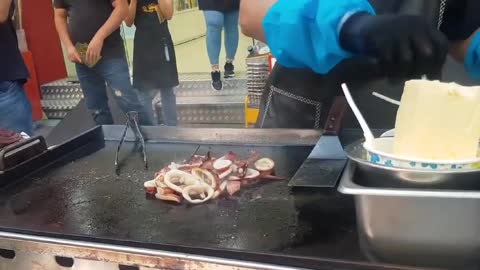 Street food grilled squid teppanyaki