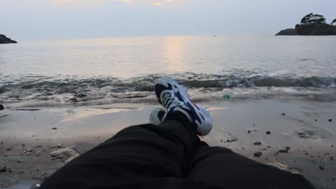 Beautiful sunset on Buan Sol Island. My feet and the sea are parallel.