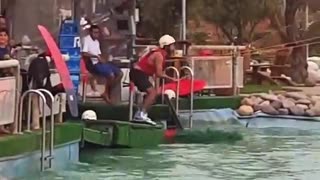 Wakeboard white helmet face plant