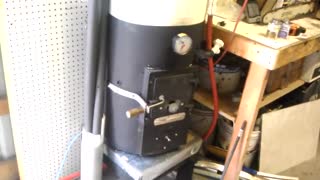 Wood fired domestic hot water heater