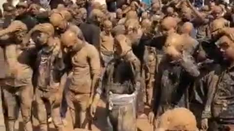 Religious Mourning in Iran, mud mud mud