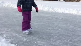 Girl Learning To Ice Skate Says It's Easy While Dad Falls Behind Her