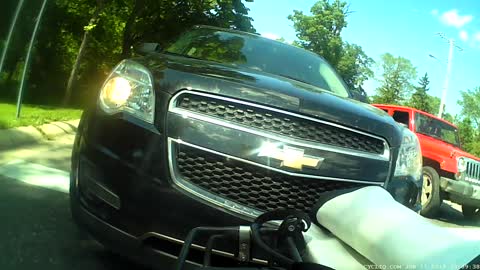 Impatient Motorist Bashes into the Back of a Bike