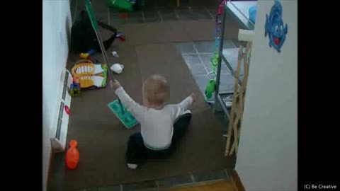 Funny Baby Cleans the House using a Swiffer...