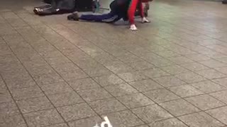 Person in spiderman outfit dances to subway music