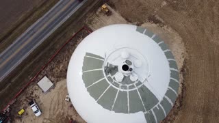 Drone video of a water tower during Painting