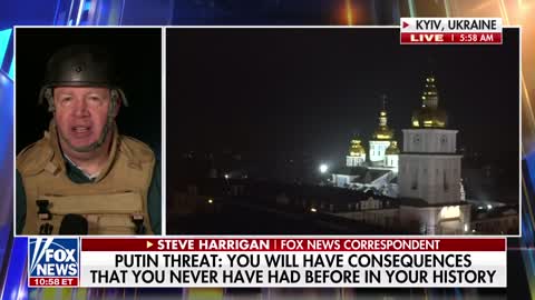 Steve Harrigan hears explosions, sees orange glow in Ukraine