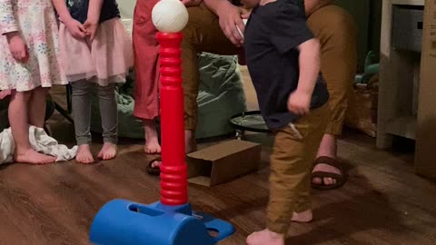 2 yr old has a unique way of hitting the ball