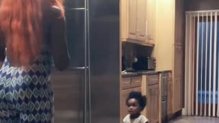 Baby Tries to Close Lady in the Fridge