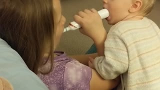 The baby and the power toothbrush