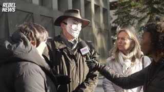 Protesters gather outside Australian embassy in Vancouver to march for freedom down under