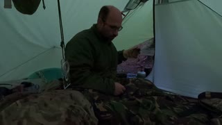 Talking into he camera in the tent. GoPro