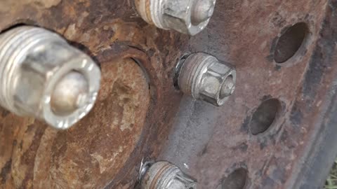 2007 Chevy Truck with loose Lug nuts.