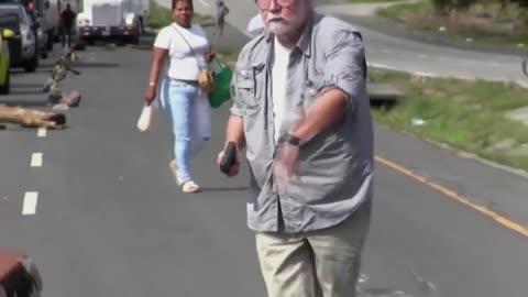 Man Shoots Protesters Blocking Traffic: Video 1