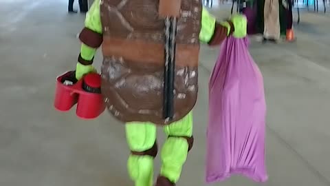 Ninja turtle arrives at the briar club for the Halloween party