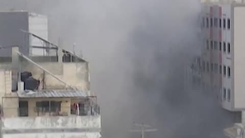 Moment_Gaza's_National_Bank_building_hit_by_Israeli_air_strike