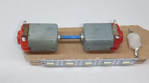 Free energy generator with two dc motors