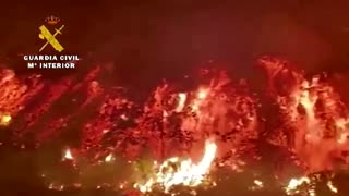 Watch a lava stream destroy a house in Spain
