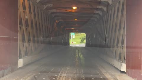 driving through a cover bridge in new england