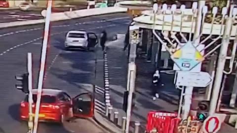 Surveillance camera footage shows the attack at the entrance to Jerusalem