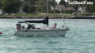 Sinfonia Sailboat Cruising Up St Clair River In Great Lakes