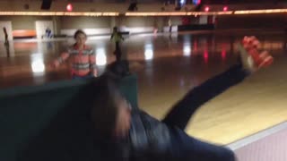 Skating man fails at the roller rink