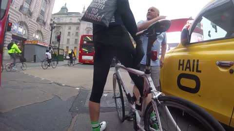 Idiot driver: Angry London Cabbie vs Cyclist