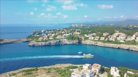 aerial view landscape of the beautiful bay of cala anguila with a wonderful turquoise sea porto