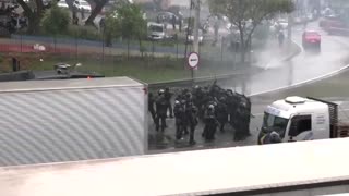 Brazilian police fire water cannon at protesters