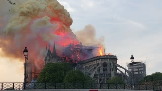 Notre Dame Spire Falling