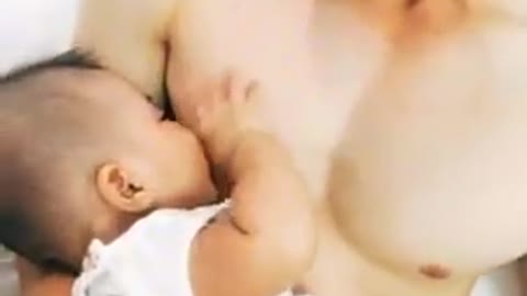 My daughter breastfeeding my husband